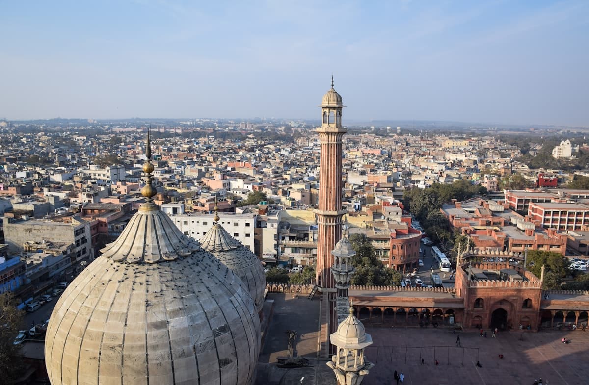 Aerial view over Old Delhi with the domes and minaret of Jama Masjid